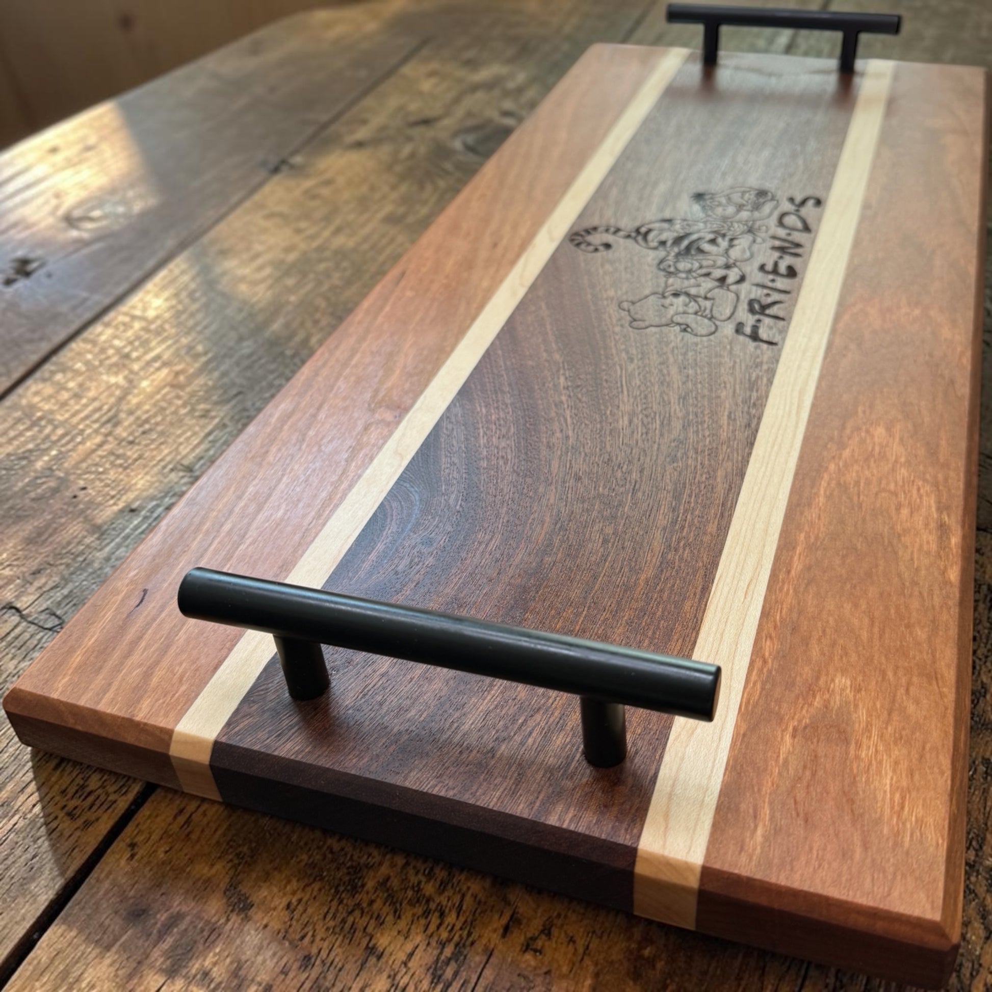 Wooden serving tray featuring Pooh & Friends characters from Covered Bridge Workshop, with colorful design and handles for serving.