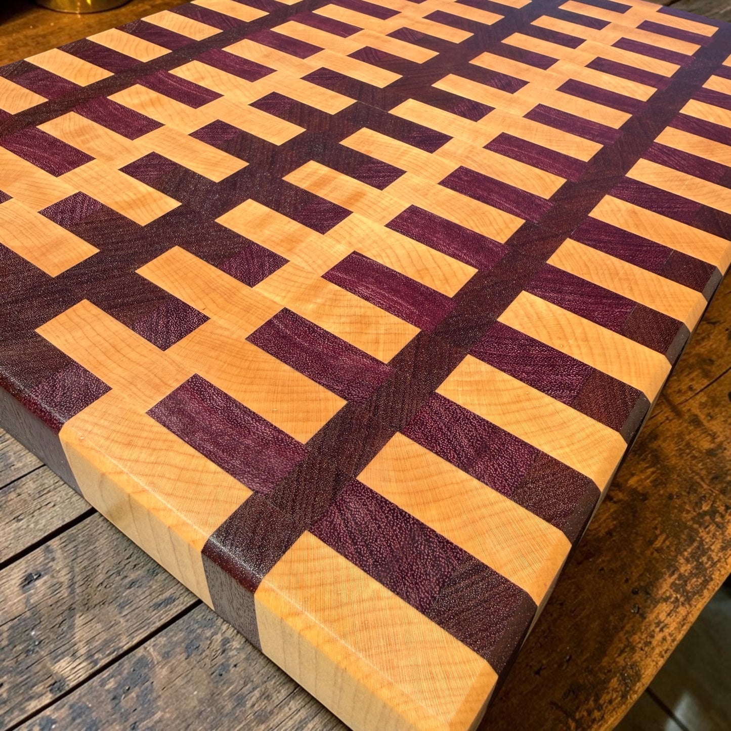 Wooden cutting board from Covered Bridge Workshop featuring a sugar magnolia design, smooth surface and natural wood finish.