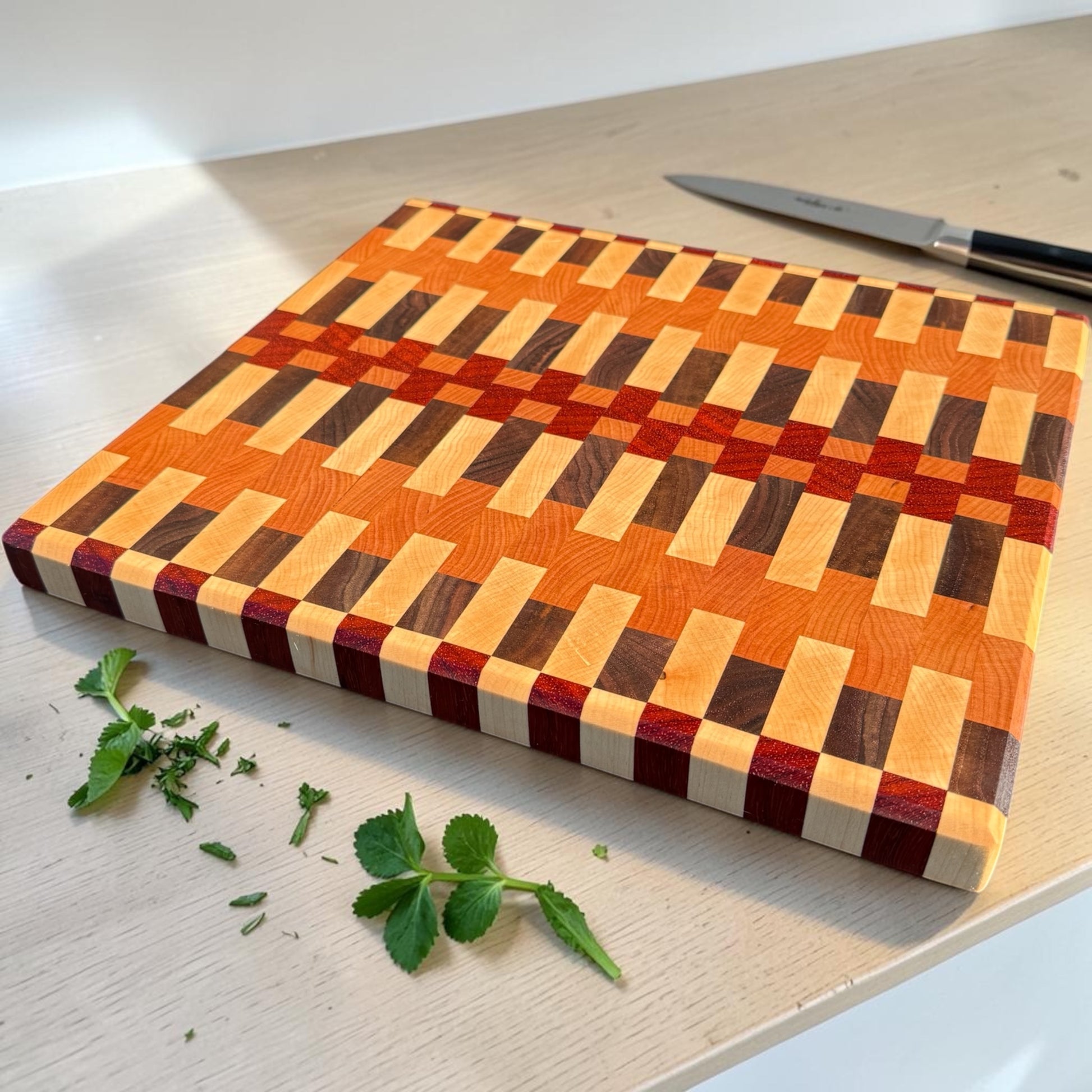 Wooden cutting board with "Dream On" inscription from Covered Bridge Workshop, ideal for food prep and kitchen use.
