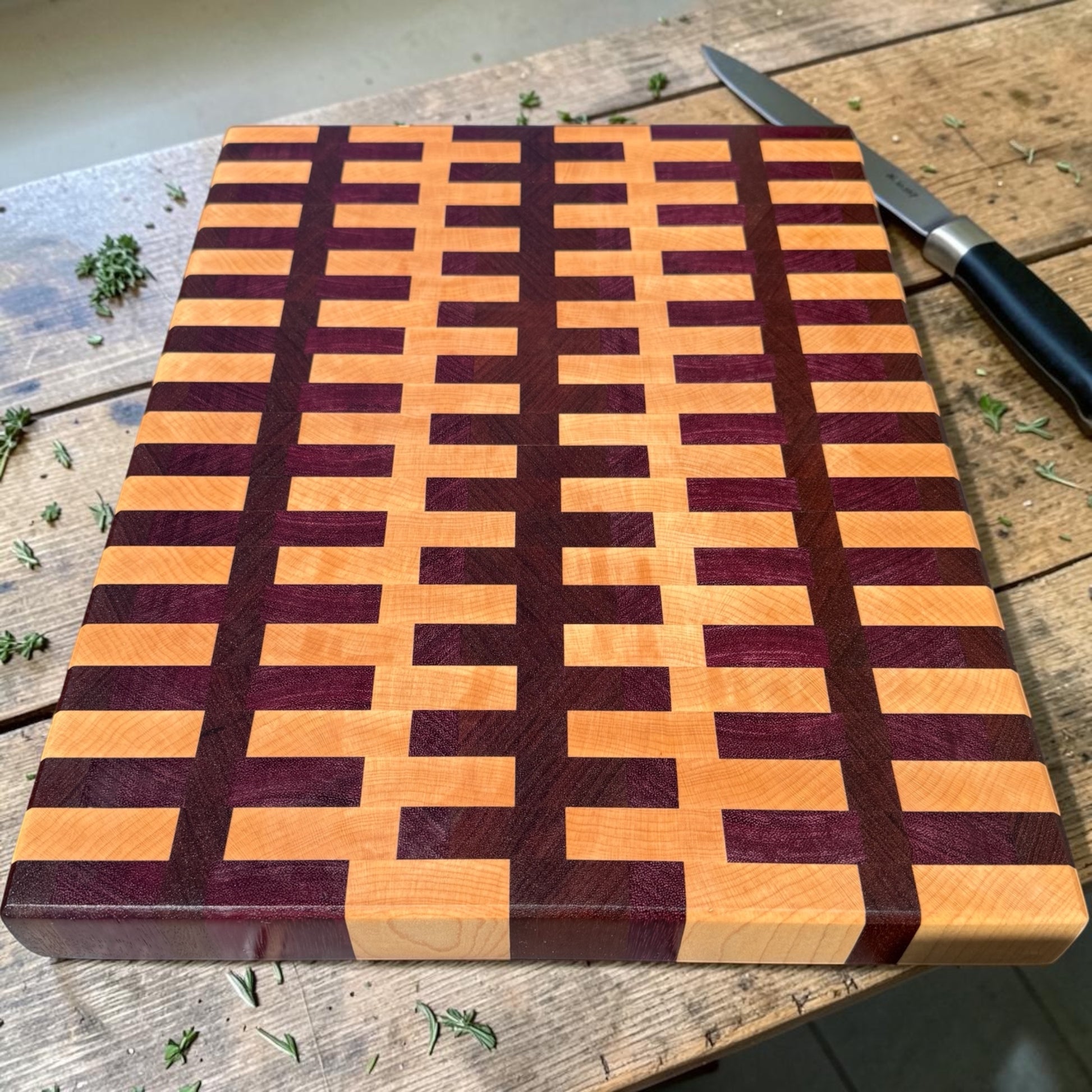 Cutting board with sugar magnolia design from Covered Bridge Workshop, made of wood, showing a natural grain pattern and smooth finish.
