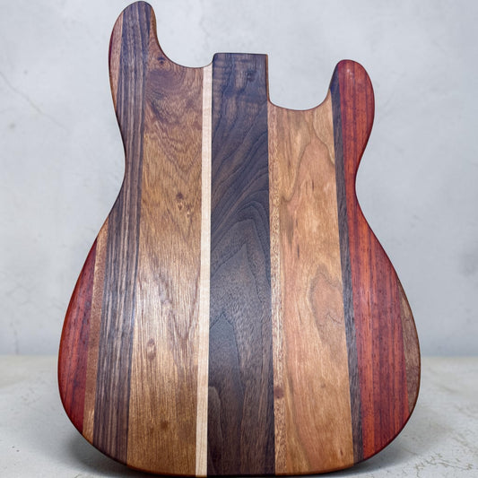 Covered Bridge Workshop SRV Strat cutting board with engraved guitar design, wood surface, and smooth edges.