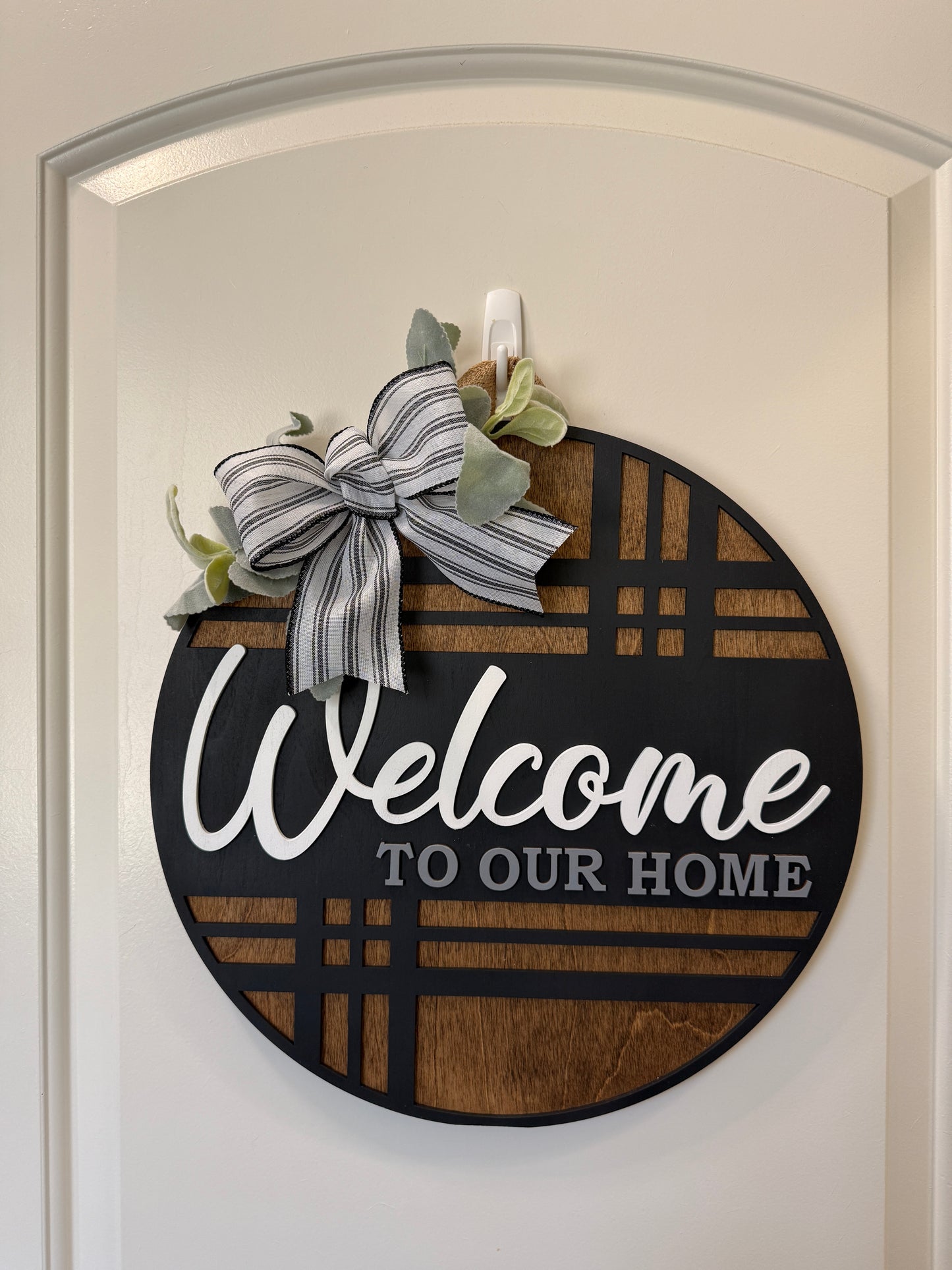 Modern plaid door hanger with "Welcome" sign by Covered Bridge Workshop, perfect for front door decor.
