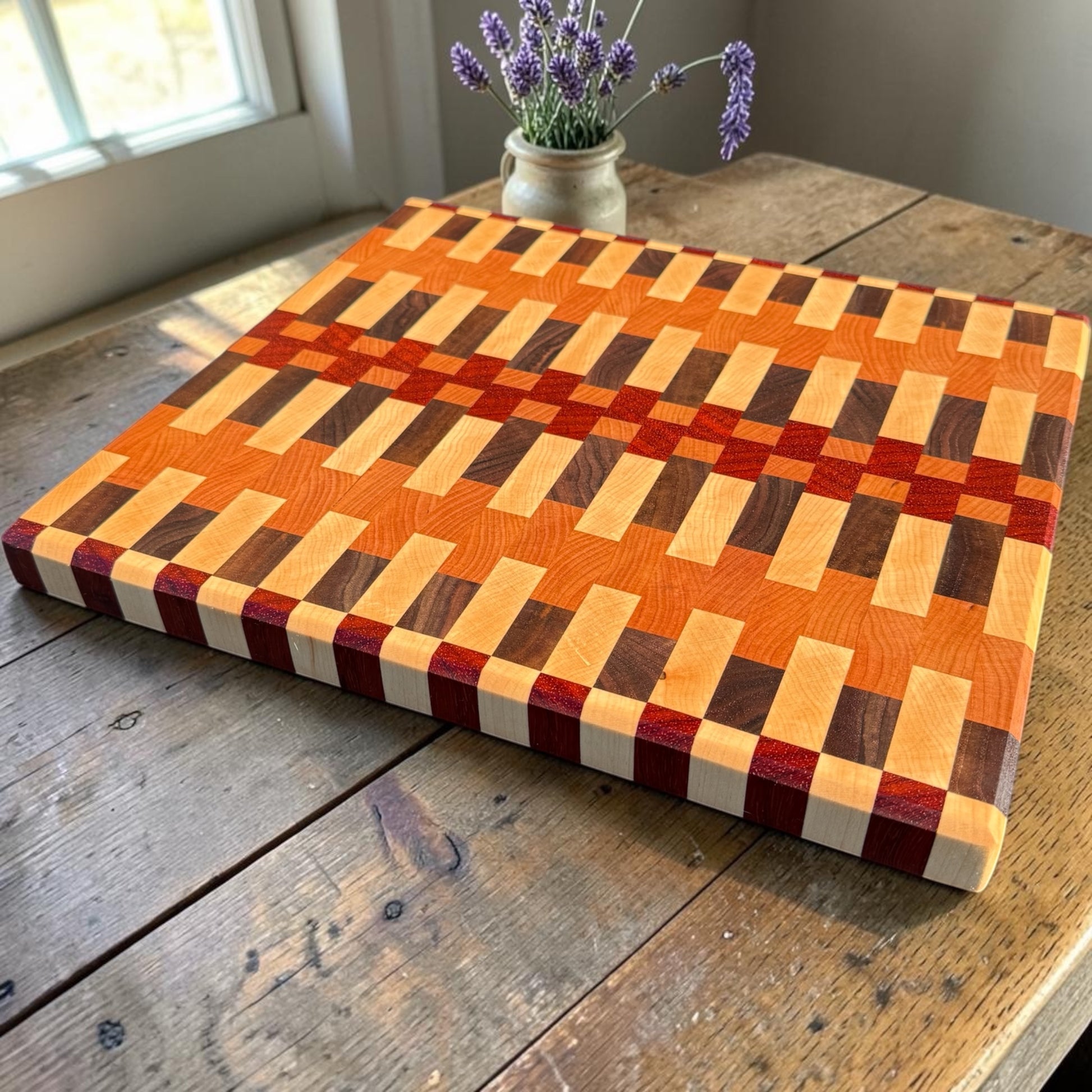 Wooden cutting board labeled "Dream On" by Covered Bridge Workshop, with a smooth surface and natural wood grain detail.