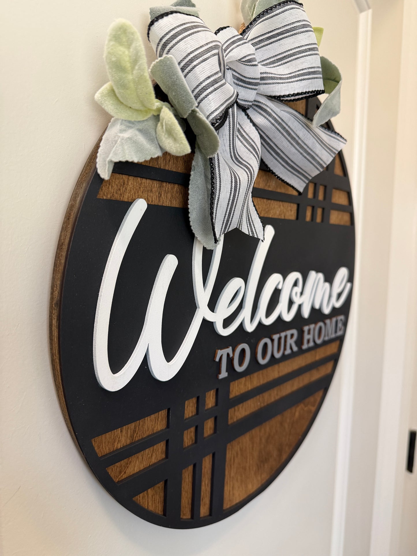 Modern plaid door hanger with "Welcome" text by Covered Bridge Workshop, perfect for front door decor.