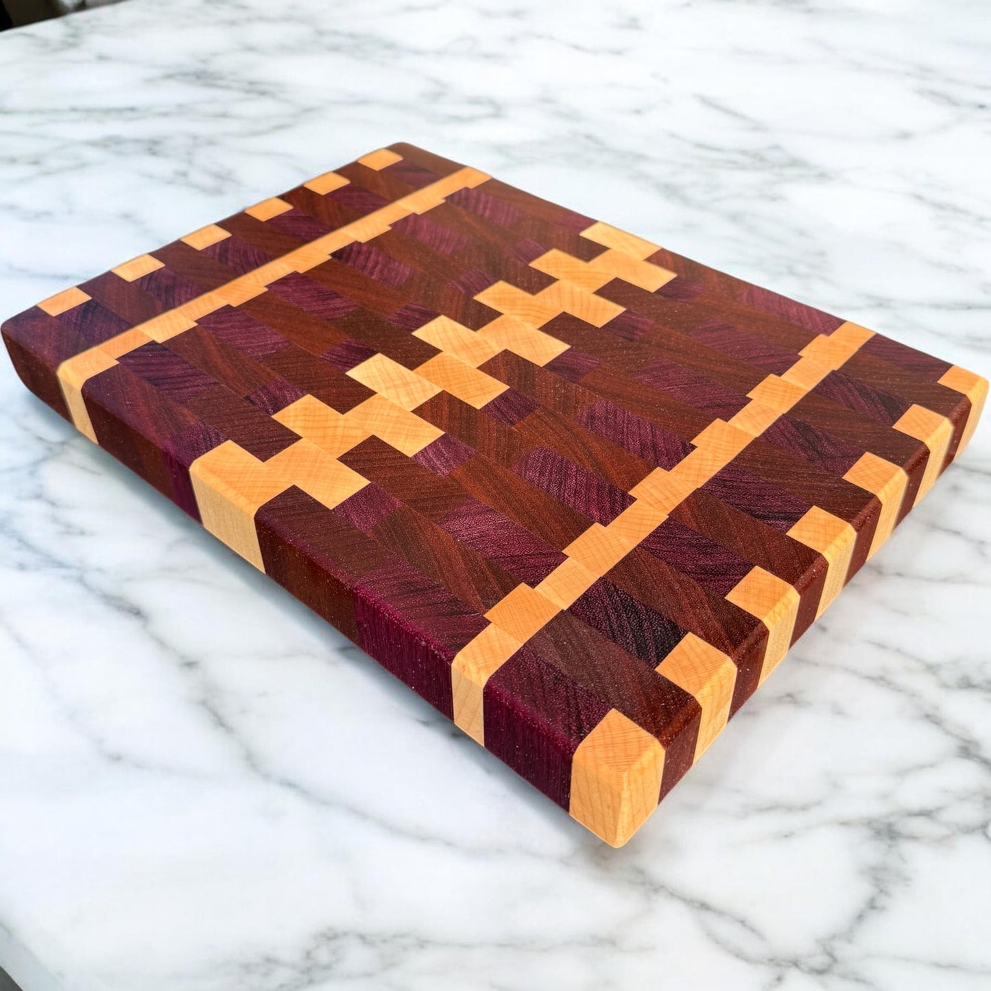 Purple Rain cutting board by Covered Bridge Workshop, featuring a vibrant purple design with a smooth wooden surface.