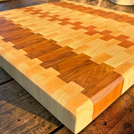 Wooden cutting board with firefly design from Covered Bridge Workshop, showcasing intricate artwork on a smooth surface.